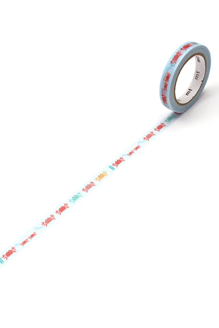 Washi tape roll with thin blue strip and red crab pattern
