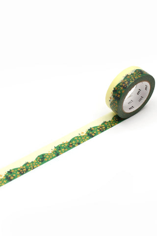 Washi tape roll with olive green and yellow cross pattern, decorative icons