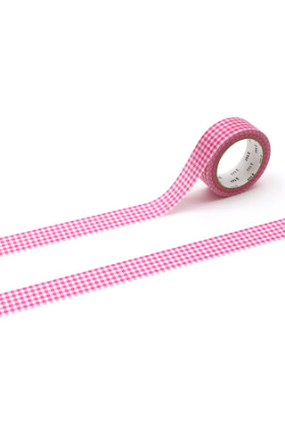 Pink checkered washi tape roll with patterned tape strip