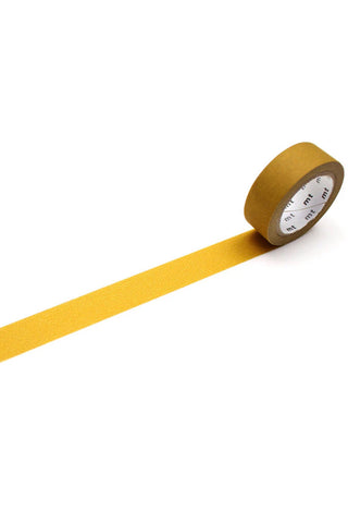 Mustard yellow matte washi tape roll with gold-toned dispenser center