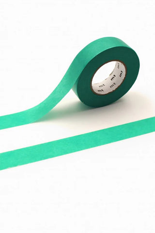 Fresh green washi tape roll with core label and loose strip, single roll