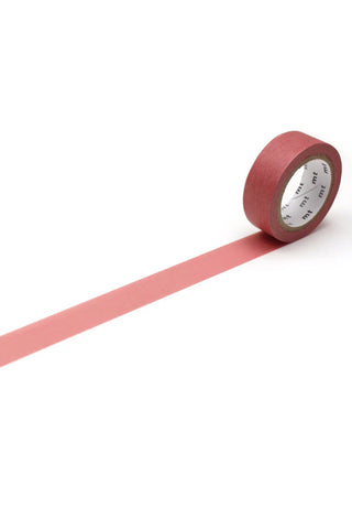 Smoky pink washi tape roll with a long strip extended