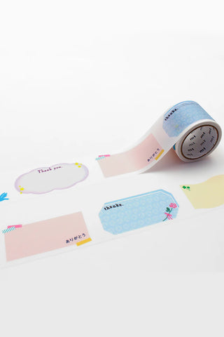Perforated washi tape roll with thank-you prints; pastel blue, pink, and yellow strips