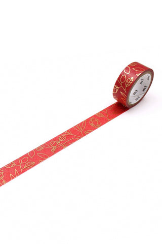 Red washi tape roll with repeating frog and geometric line pattern