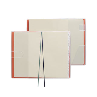 Two khaki/cream planners with orange edges, vertical B6 slim size