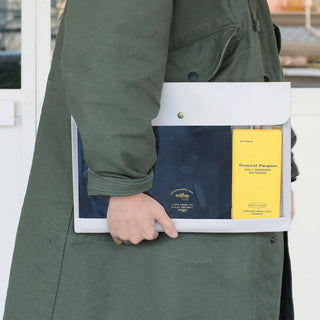 Dark blue general purpose case with snap button and clear pocket holding booklets and cards