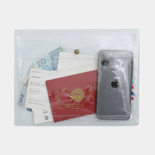 Clear general purpose case pouch holding stationery and a phone-sized device; brass snap.