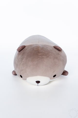 Small otter hugging pillow plush, taupe-gray face with brown ears and white muzzle