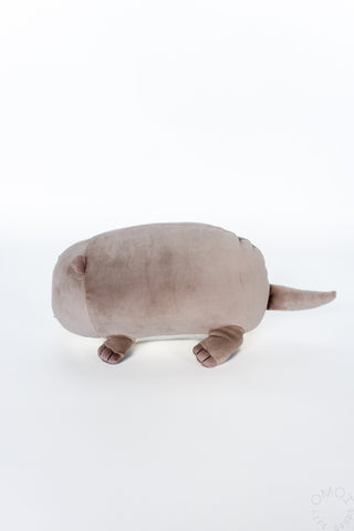 Small otter hugging pillow plush, taupe-gray body with rounded belly and small feet