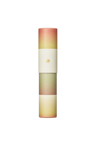 Gradient incense stick holder tube with gold logo; stacked band colors