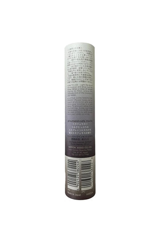 Incense tube with printed ingredient text on back, gradient mauve and beige body