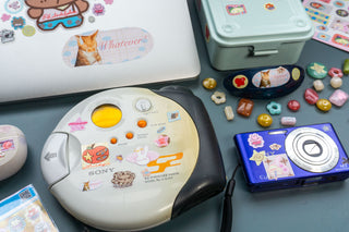 Sticker sheet set in clear packaging with cartoon icons and small accessory pieces