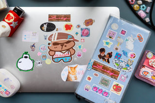 Sticker sheet with die-cut cartoon bear and multiple cute icons in a clear case