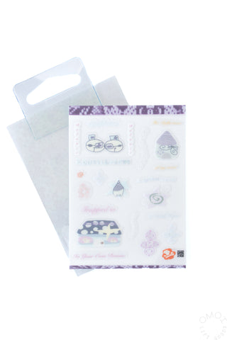 Sticker sheet in clear sleeve with purple border and multiple pastel icon stickers