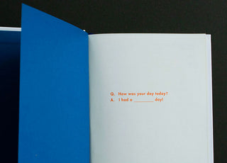 Open diary notebook with a blank page and printed "How was your day today?" prompt