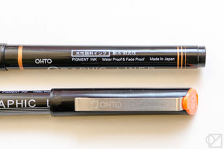 OHTO graphic liner pen barrels marked pigment ink, waterproof, and fade proof