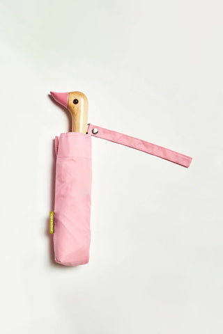 Powder pink compact duck-shaped umbrella with wooden-style handle and wrist strap