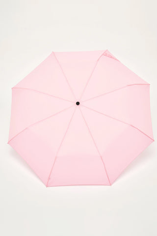 Powder pink open compact duck umbrella with vented canopy and center hub