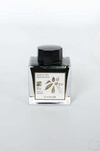 Bottled ink with black cap, Shirakashi label and leaf illustration, 50 ml