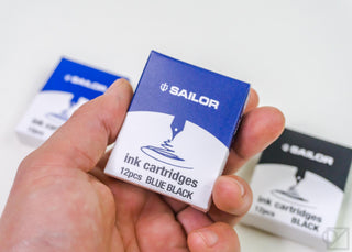 Sailor ink cartridges box for blue black, 12 pcs, held in hand