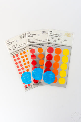 Three circular masking tape dot sticker packs with red, orange, yellow, and blue dots