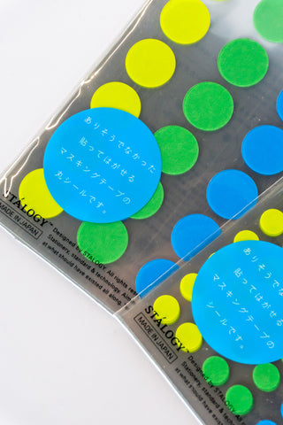 Dot sticker pack with neon yellow, green, and blue round stickers in retail packaging