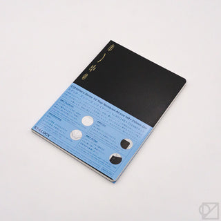 A5 dot-grid notebook set with black cover and blue instruction panel