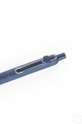 Blue gel pen with metal pocket clip on the barrel