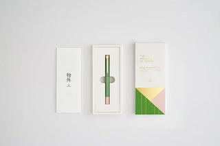 Green rollerball pen in box with small accessory packaging