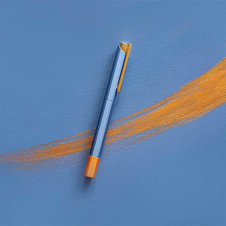 Blue rollerball pen with gold cap and orange end detail