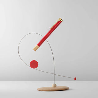Red rollerball pen with gold tip and cap