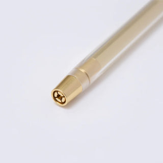 Gold brass dip pen body end view with circular metal opening and ring