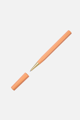 Orange rollerball pen with gold tip and matching cap