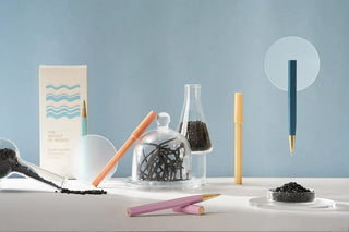 Sea-indigo sustainable rollerball pen with gold tip and teal barrel
