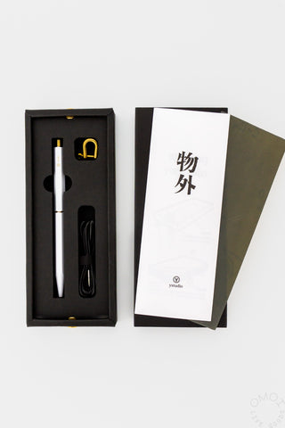 White ballpoint pen set in a black box with included sleeve