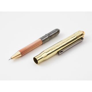 Brass and copper ballpoint pens with exposed metal nibs and end caps