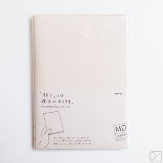 Beige notebook paper cover with small printed text and MD PAPER logo badge