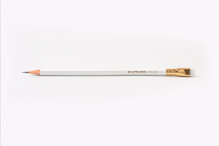 Pearl style graphite pencil with light body and gold ferrule
