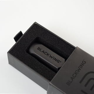 Blackwing long point pencil sharpener in black tray, with branded insert