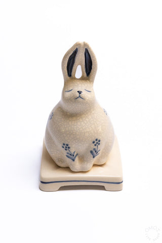 Crackle porcelain rabbit incense burner with blue floral decals and arched ears on base
