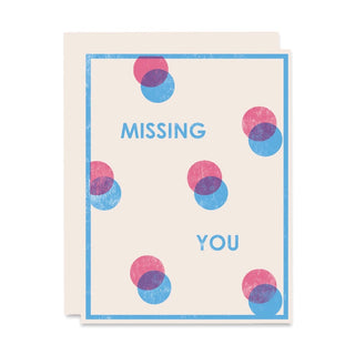 Letterpress card: blue border, multicolor dots, text 'MISSING YOU'
