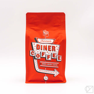 Red coffee bag with Herman's Diner Coffee label, 12oz.