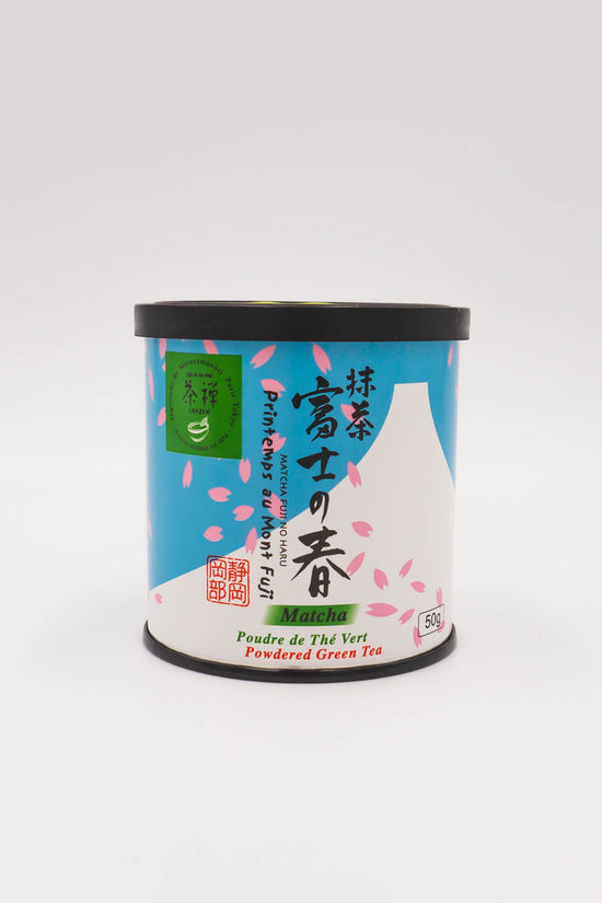 Ceremonial grade matcha tin, blue-and-white label with black lid