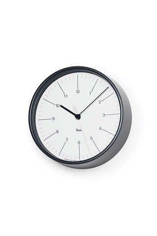 Wall clock with white dial and black rim, with hour markers and hands