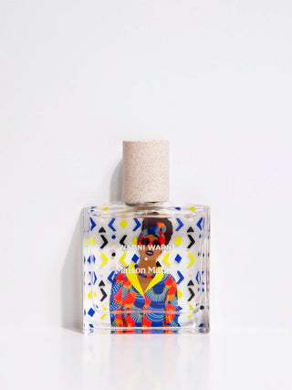 Maison Matine Eau de parfum bottle with cork and colorful geometric artwork