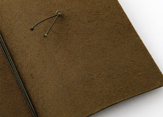 Olive notebook cover top with cord eyelets and drawstring