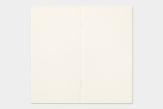 Traveler's notebook sticker release paper, plain cream sheet, top view