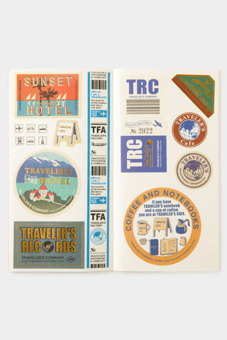 Traveler's notebook sticker release paper with printed sticker sheets and labels