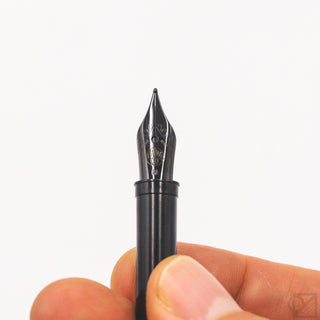 Kaweco black steel nib 060, close-up showing tip and central slit