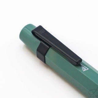 Sport pen clip in black metal on teal pen barrel, hinged clasp detail